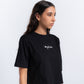 "بنت ابوها" cropped T-shirt in Black