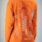 “Bent Abouha” Long-Sleeve T-shirt in Orange