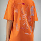 “Bent Abouha” T-shirt in Orange